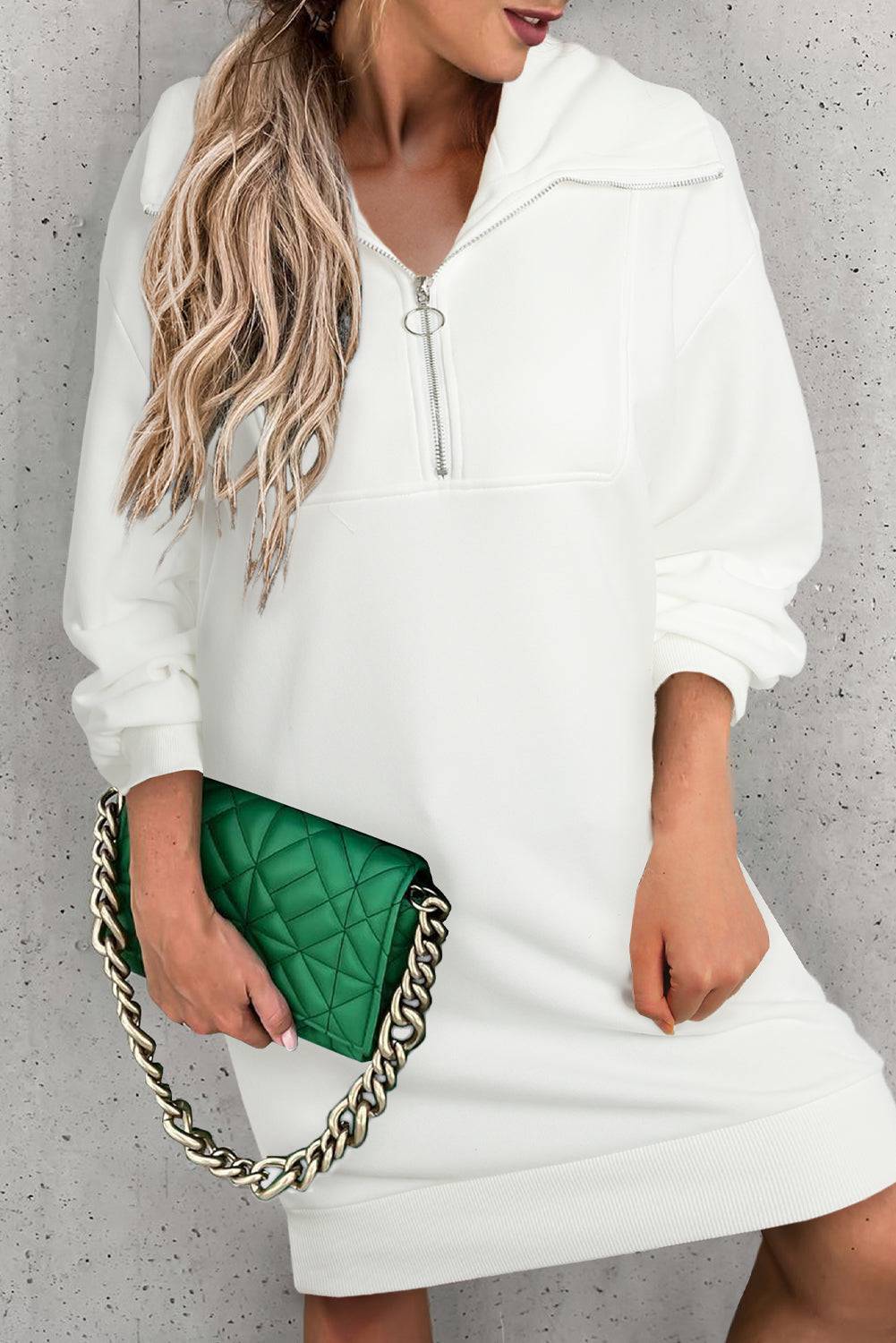 Upgrade your casual style with the Half Zip Sweatshirt Dress, the perfect blend of comfort and chic.