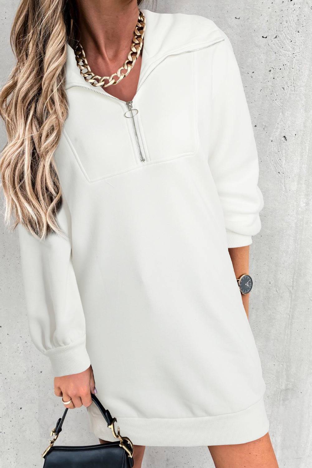 Upgrade your casual style with the Half Zip Sweatshirt Dress, the perfect blend of comfort and chic.