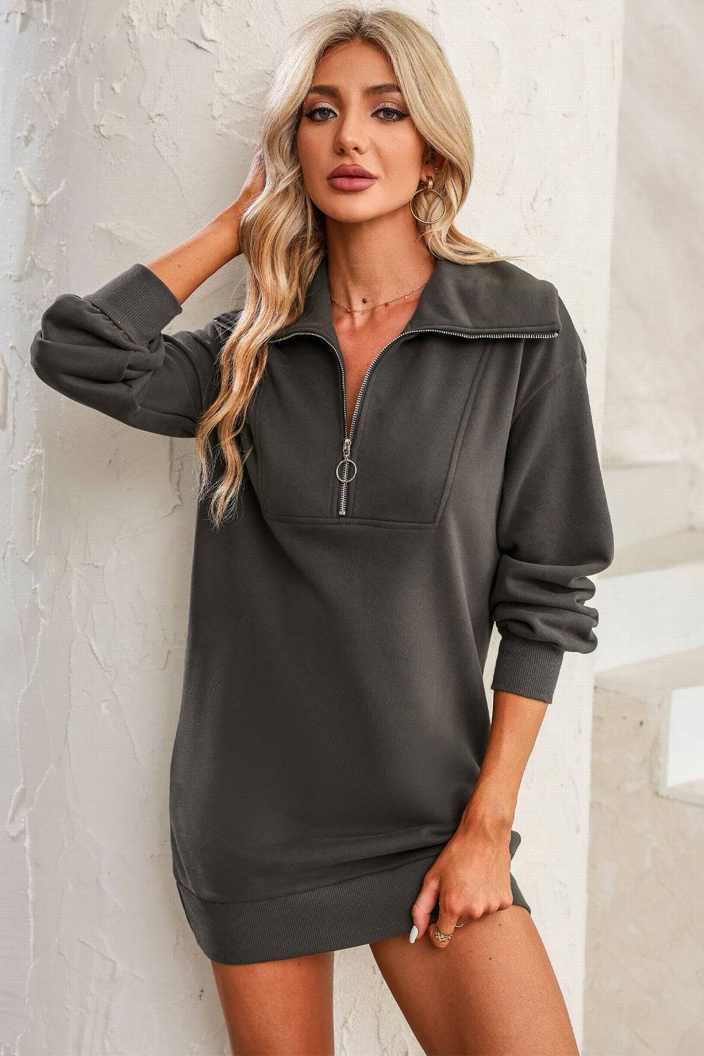Upgrade your casual style with the Half Zip Sweatshirt Dress, the perfect blend of comfort and chic.