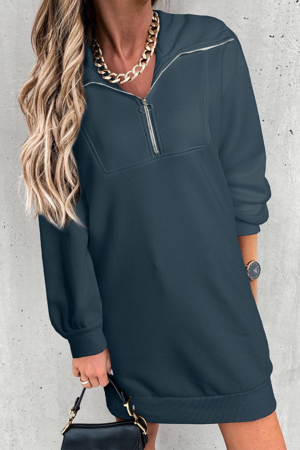 Upgrade your casual style with the Half Zip Sweatshirt Dress, the perfect blend of comfort and chic.