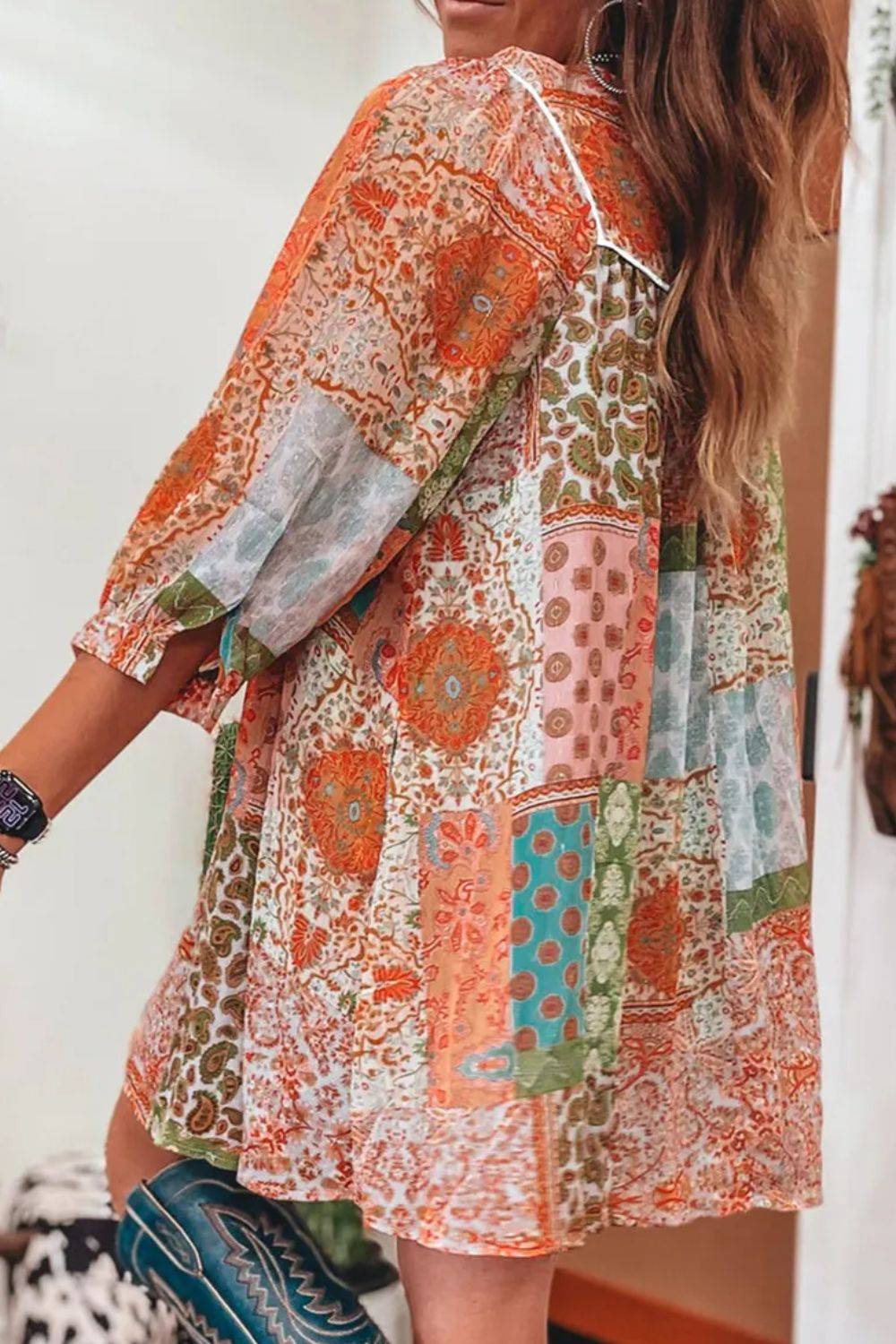 Playful Tassel Mini Dress with Three-Quarter Sleeves