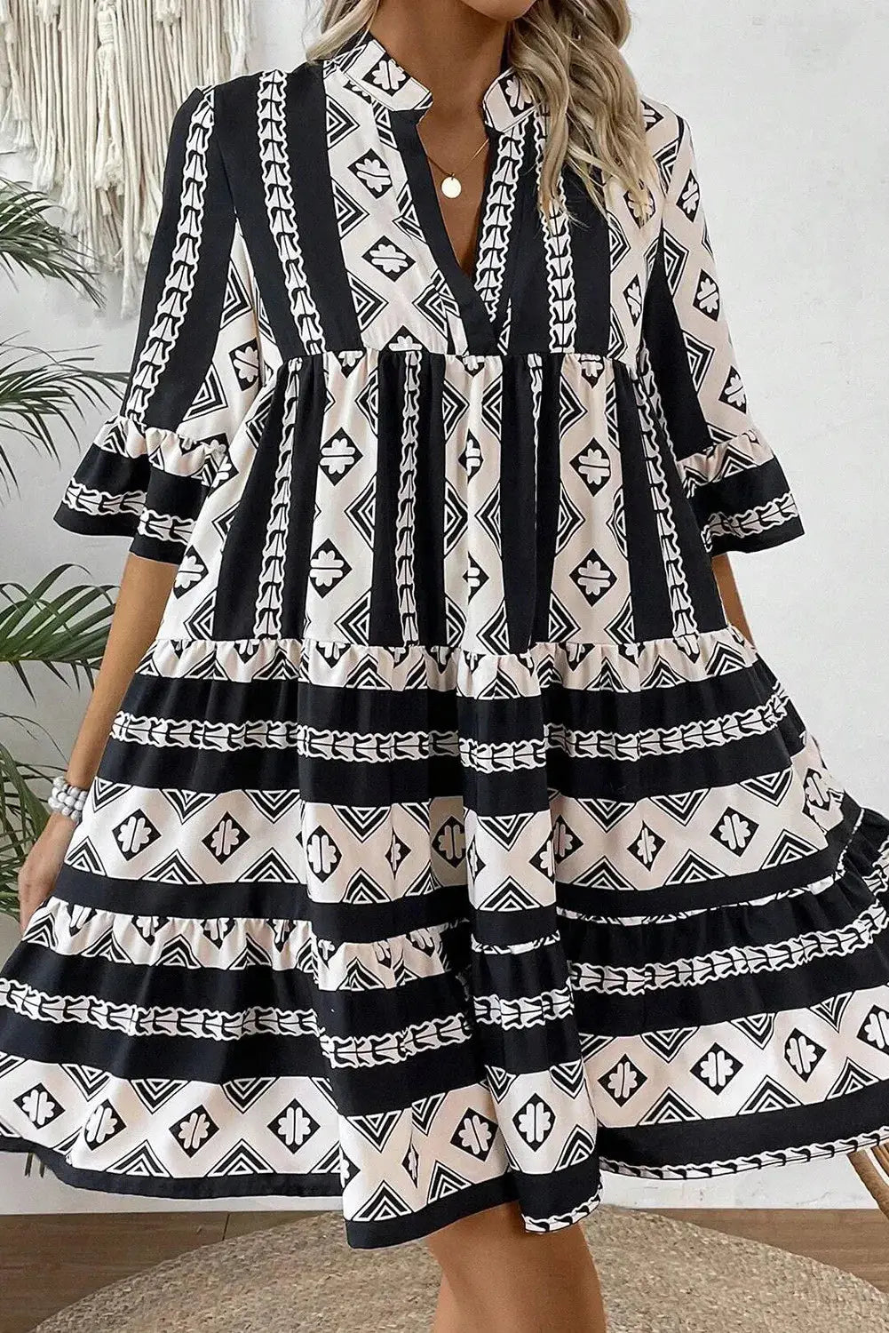 Elegant Tiered Notched Neck Dress with Half Sleeves